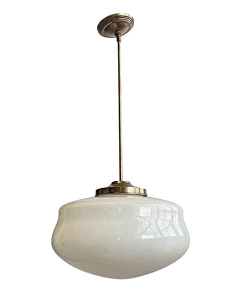 Ideal in hallways with tall ceilings, above a small table, or paired up over a kitchen island. 1940s Schoolhouse 16 in. Globe Brass Pole Pendant Light | Olde Good Things