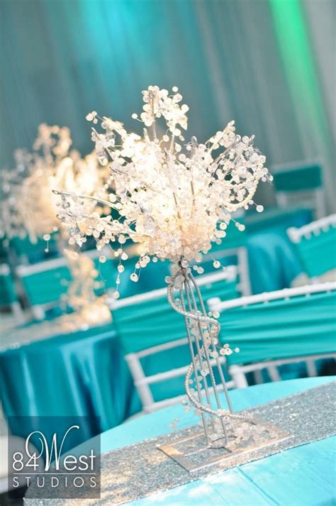 See more ideas about sweet 16 centerpieces, sweet 16, centerpieces. Sweet 16 centerpieces using crystal trees in tiffany blue ...