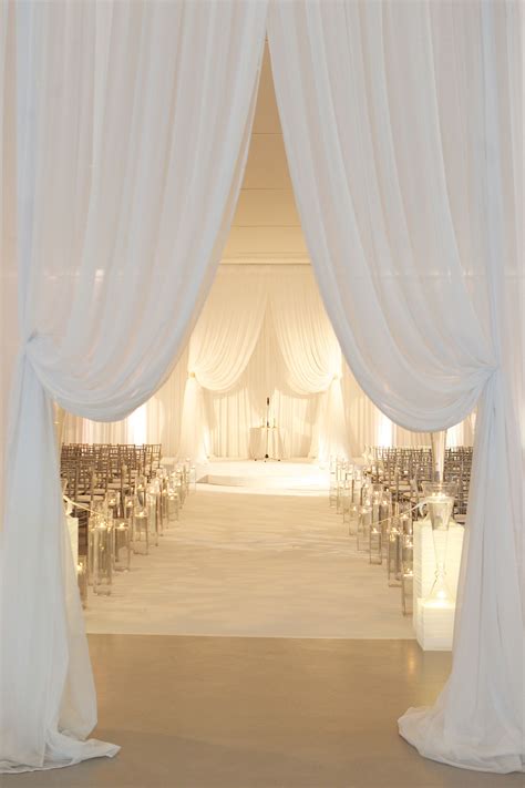 Rustic indoor wedding aisle decor deer pearl flowers. How to Transform Your Wedding with Romantic Drapery ...