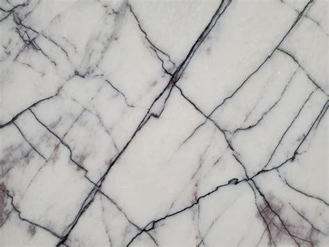 Dimension stone is produced by sawing marble into pieces of specific dimensions. Lilac | Marble Slab by Primestones®