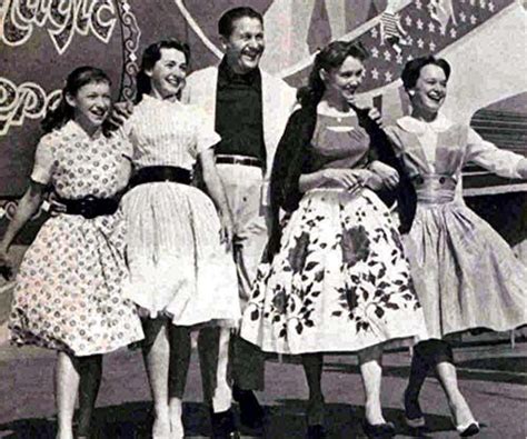 Want to find out who they refer? The Lennon Sisters with Lawrence Welk outside the Magic ...