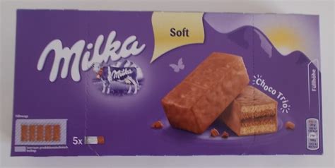 Mit dem rest sahne 16 tupfen im kreis auf dem kuchen machen. Milka Choco Trio Kuchen - Küchlein - BlogTestesser