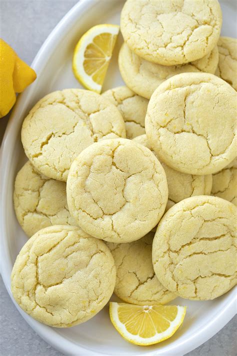 In a second bowl mix sugar, butter, eggs and lemon extract. Christmas Cookies With Lemon Oil / Funfetti Christmas ...