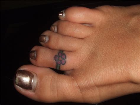 Dragonfly toe tattoo for girls. Flower Toe Ring On Right Foot Tattoo Picture