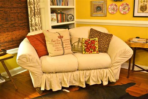 After installing the slipcover on the sectional sofa, you will do the same for its cushions tuck. pin. done: no-sew loveseat slipcover in 30 (With ...