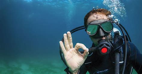Underwater diving, human activity underwater for recreational or occupational purposes. 5 Tips For Effective Underwater Communication | Scuba Diving
