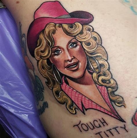 For years, fans have speculated that her signature long sleeves ( and gloves ) are more than a fashion statement, and the queen of country recently admitted to people that she does, in fact, have multiple tattoos. 35 Amazing Dolly Parton Tattoos - NSF - Music Magazine