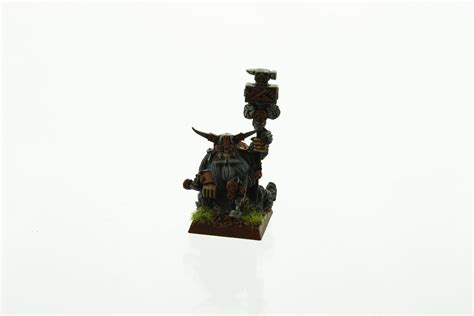 Here is a dwarf runesmith/runelord. Dwarf Runesmith | WHTREASURY