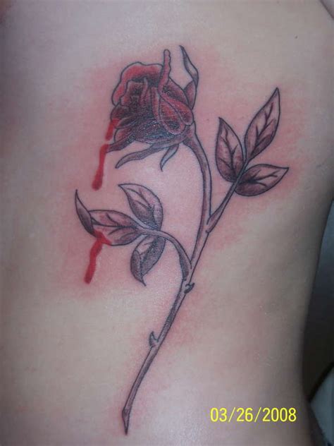 Importance of black rose tattoo; Bleeding Rose tattoo