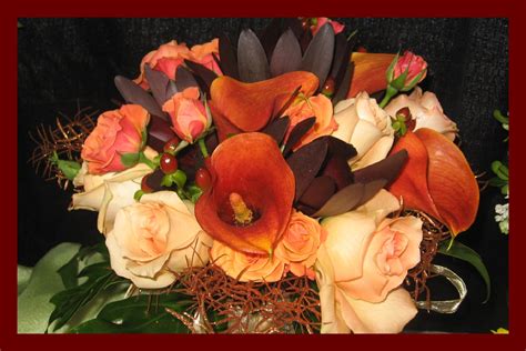 Maybe you would like to learn more about one of these? Combo of soft oceana roses, rust color mini callas and ...