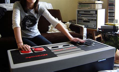 Level up your living room's interior decor with this stunning retro nes controller coffee table. Resurrect the world of 80's video games with NES ...