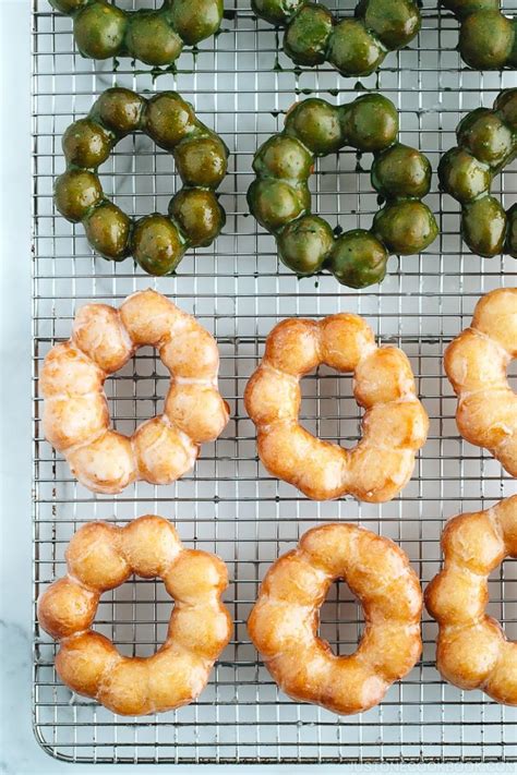 These whimsically shaped pon de ring doughnuts easily pull apart so you can eat each chewy dough ball one by one. Pon de Ring Donut | Recipe | Recipes, Food