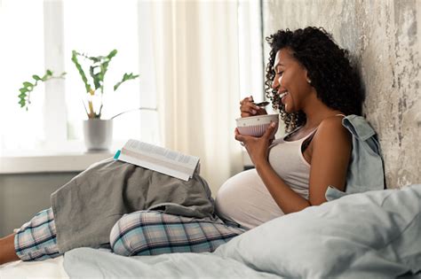 Pregnant women are more likely to be sexually aroused during the third trimester and the first or third. Smiling Pregnant Woman Having Breakfast In Bed Stock Photo ...
