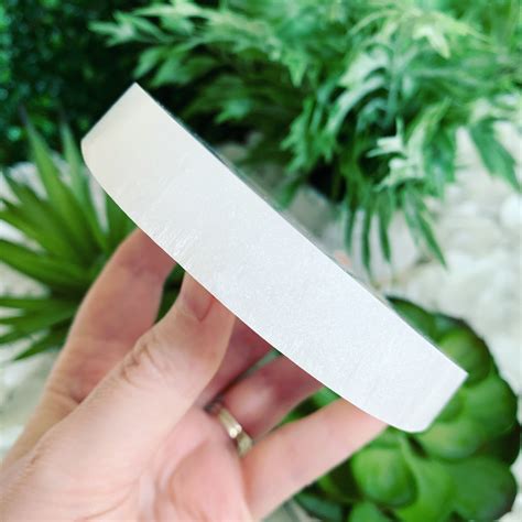 Check spelling or type a new query. Round Selenite Charging Plate