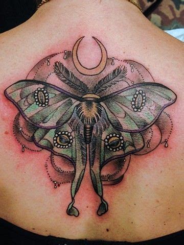 Spanish luna moths are by far my favorite of the saturniidae family <3 accented with shiny citrine crystals and illuminated with a crescent moon! Luna Moth Tattoo Luna moth | Moth tattoo, Luna moth tattoo