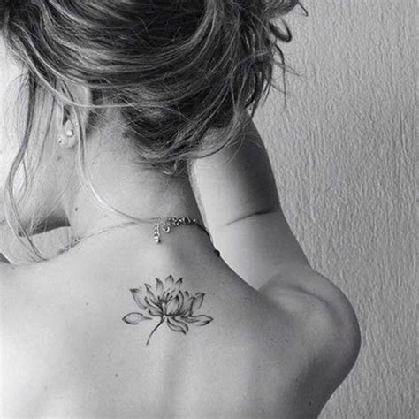 Elegant small geometric neck tattoo. Lotus Flower Tattoo Designs - Love Ambie