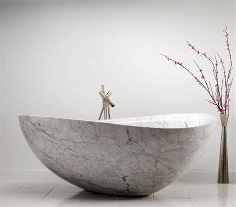 With soft lines and graceful curves, calma, carved from limestone or marquina taupe, weighs 1,800. Amazing Bathtub Designs - Designbuzz