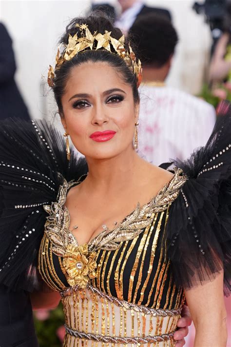 Salma hayek flaunts great cleavage in bavarian dress. SALMA HAYEK at 2019 MET Gala in New York 05/06/2019 ...