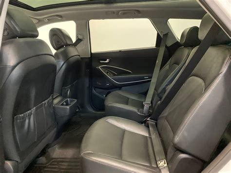 5.to use the rear seat, lift and pull the seatback backward by pulling on the folding lever (2nd row) or strap (3rd row). Hyundai of Regina | 2017 Hyundai Santa Fe XL Luxury 3rd ...