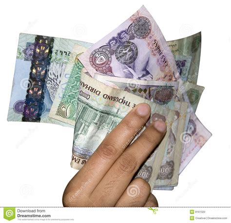 Emirates money has five branches in dubai and one in abu dhabi. UAE Money Currency stock photo. Image of hand, arab ...