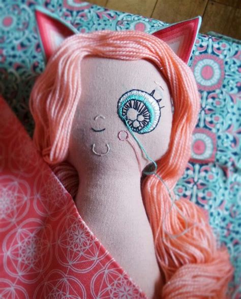 But im not sure if the ears are an item, or if they made it with the hair customization. Cat girl doll, handmade doll, heirloom ooak Wubsys, coral and mint, yarn hair, hand embroidered ...