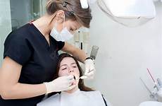 dentist treating dentista paciente trata