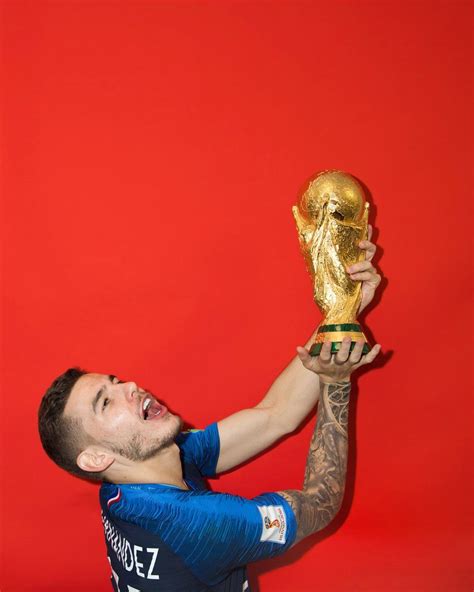 Fans got to vote for a squad of 11 players from a pool of 55 nominees, with cb: Fifa World Cup 2018 - Lucas Hernandez poses with World Cup ...