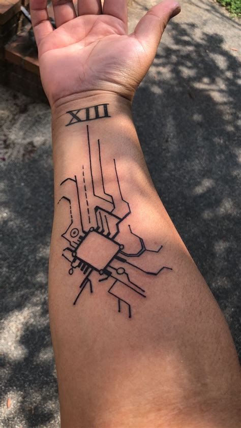 Football playing isgn board tattoo on back leg. Tried a circuit board tattoo and it is EVERYTHING! Even though people tell me th... | Wrist ...