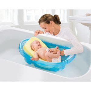 The american academy of pediatrics recommends sponge baths until the umbilical cord stump falls off — which might take a week lay your baby on his or her back in the prepared area. Bathtub Inserts For Babies | Baby bath sponge, Baby bath ...