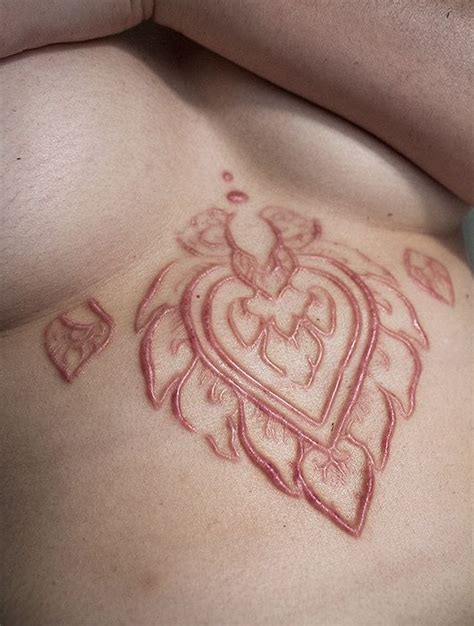 Still, another similar process of creating images on the skin is called scarification. Not a tattoo but looks awesome; scarification | I've ...