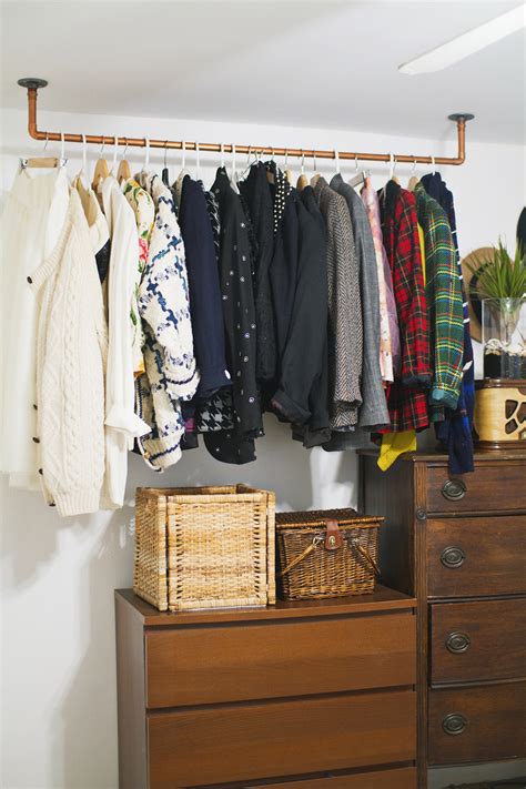 Mommy and me clothing racks. Hanging Copper Pipe Clothing Rack DIY - A Beautiful Mess