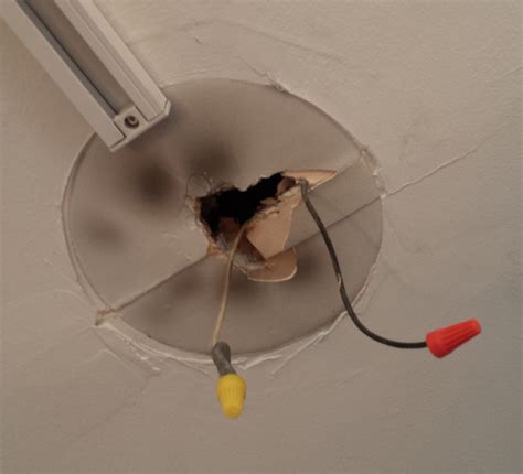 Add a box | where connections aren't contained in an electrical box, install a box and reconnect the wires inside it. electrical - Installing a fixture with no ground, no ...