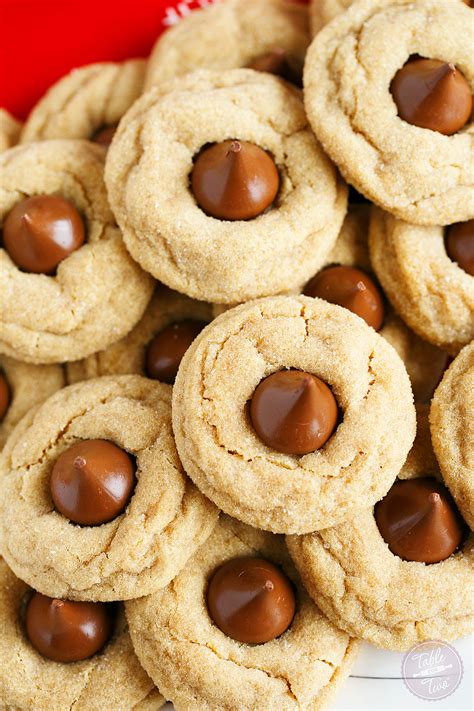 The chocolate kiss comes wrapped in silver foil which needs to get removed. Peanut Butter Blossom Cookies - Table for Two