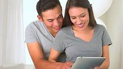 Hispanic Couple Using Tablet Stock Footage Video (100% Royalty-free) 3774047