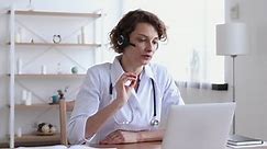 Female Medical Assistant Wears White Coat Stock Footage Video (100% Royalty-free) 1048839271 | Shutterstock