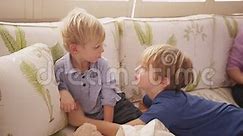 Mother and Son Play Tickle with Baby Brother Stock Video - Video of casual, people: 257641817