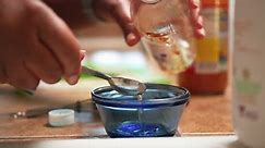 Measuring Apple Cider Vinegar Into A Small Glass Bowl To Add To A Homemade Recipe - Slow Motion Free Stock Video Footage Download Clips