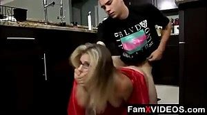 Cory Chase in the kitchen swallowing stepson
