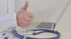 Side View of Doctor Hand Doing Thumbs Up