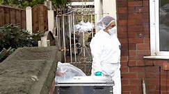 Police search Salford house after body parts found