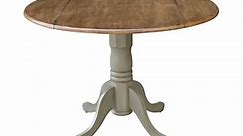 42" Round Solid Wood Dual Drop Leaf Pedestal Table in Distressed Hickory/Stone - 29.5" Dining Height by International Concepts