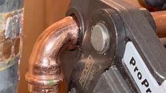 Pressing a hot water tank together #plumbing #plumber #hotwatertankinstall | The Impetus