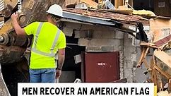 Men Recover an American Flag From a Demolished Building