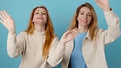 Friends Woman Showing Handshake Gesture Hello Stock Footage Video (100% Royalty-free) 1105438585 | Shutterstock