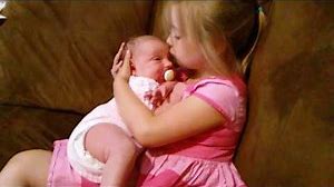 5-Year-Old Big sister gets newborn baby to sleep!