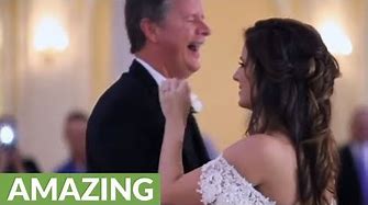 Dad receives special surprise during father-daughter wedding dance