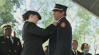 Navy Daughter Surprises Fire Captain Dad At His Promotion Ceremony