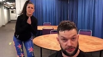 Bayley strives to get Finn BÃ¡lor's attention en route to Mixed Match Challenge: Exclusive: Dec. 17