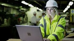 A Female Warehouse Employee Wearing Stock Footage Video (100% Royalty-free) 3817700